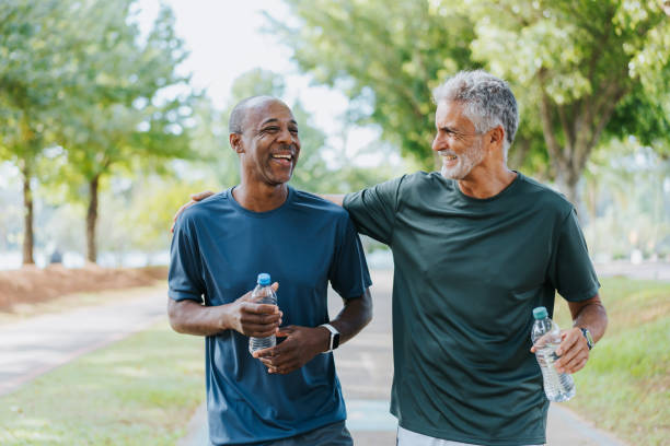 two men walking benefits of accountability partners