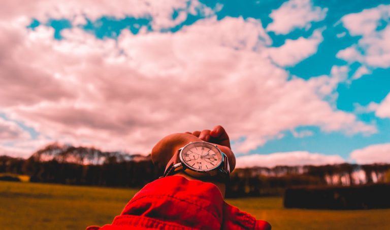 guy looking at watch outside how long does it take to recover from a porn addiction